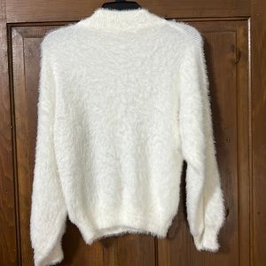 Cream fuzzy sweater size large